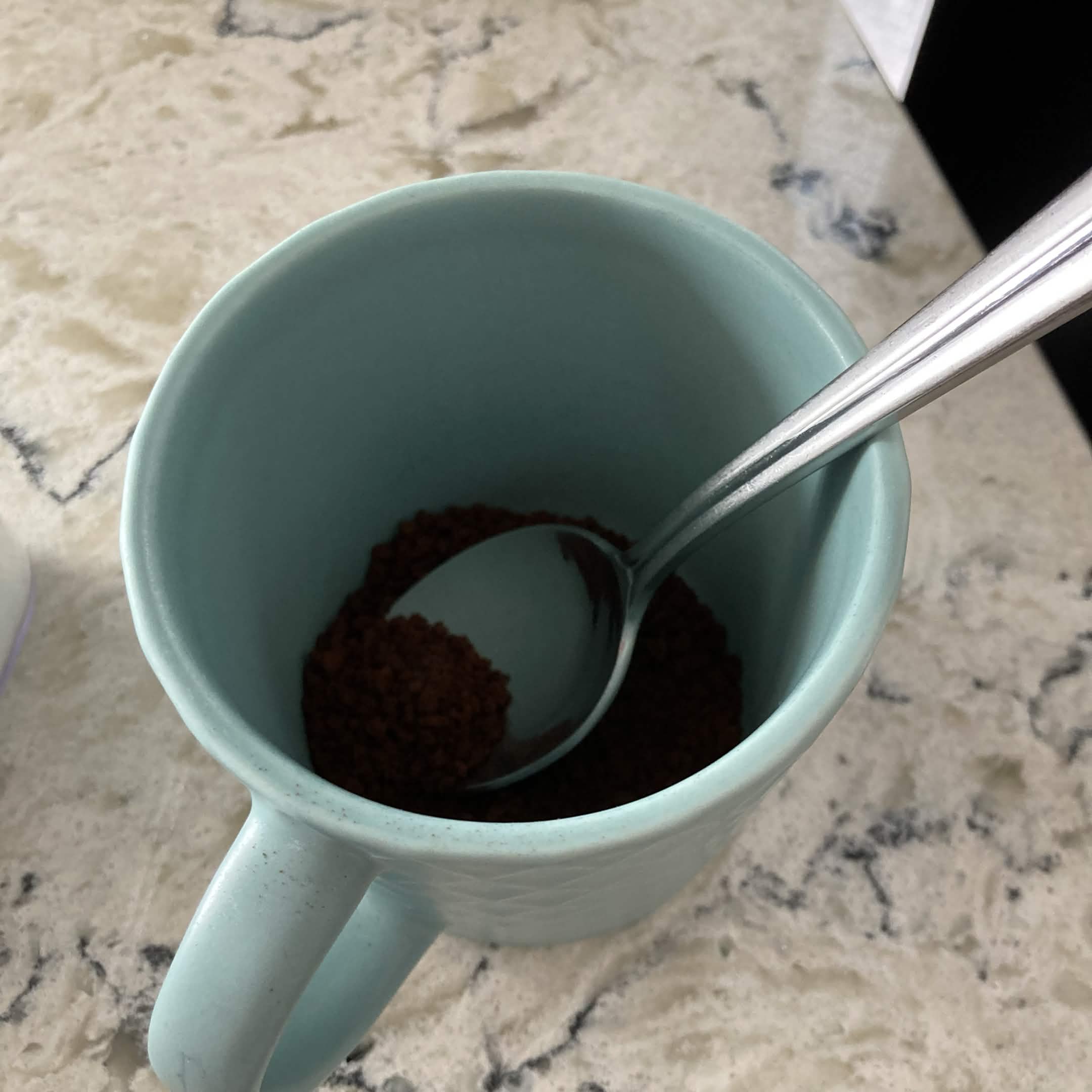 scooping instant coffee and putting it in mug<br><audio controls src='/audio/13.m4a'></audio>