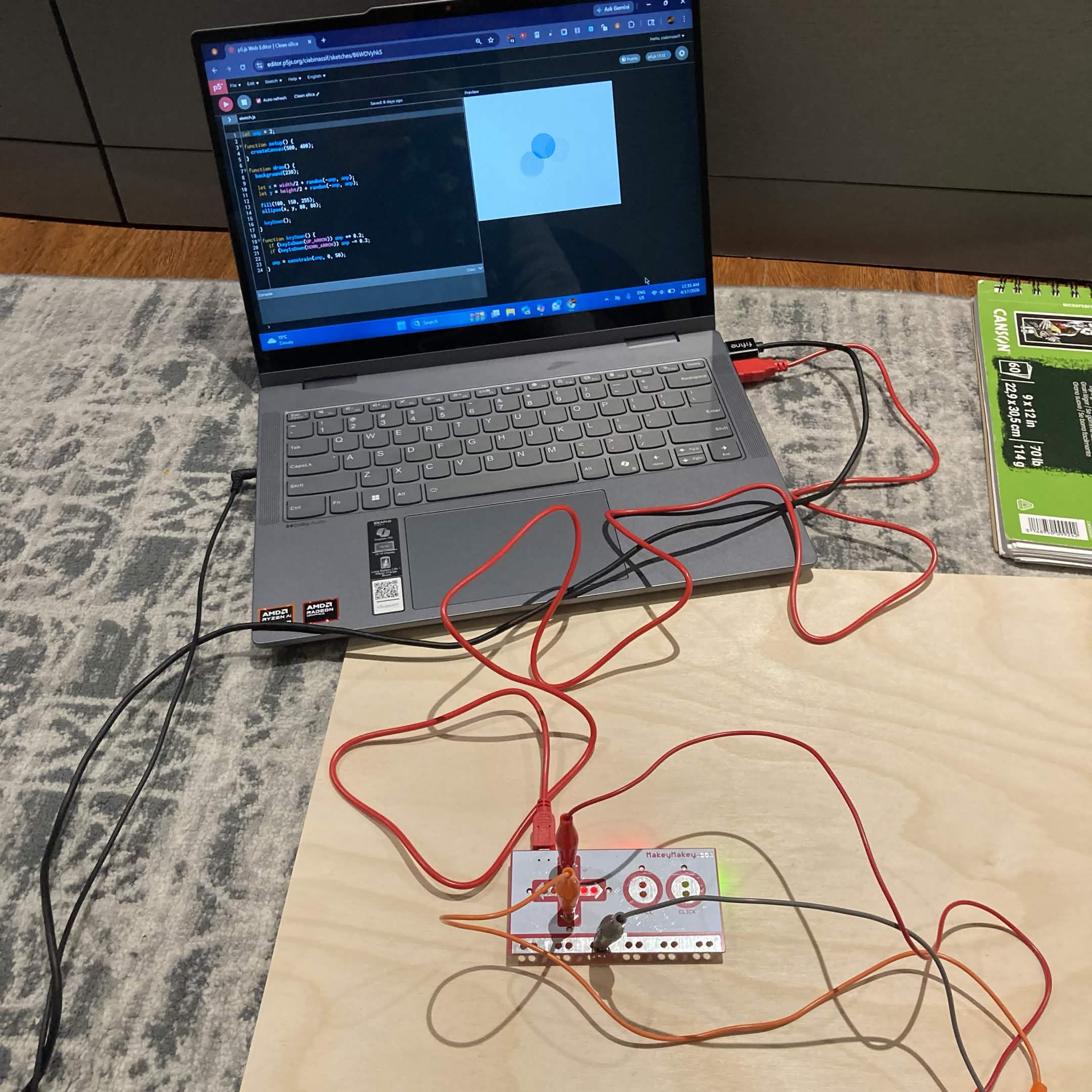 Testing the second function on the Makey Makey to make the circle in the sketch vibrate.